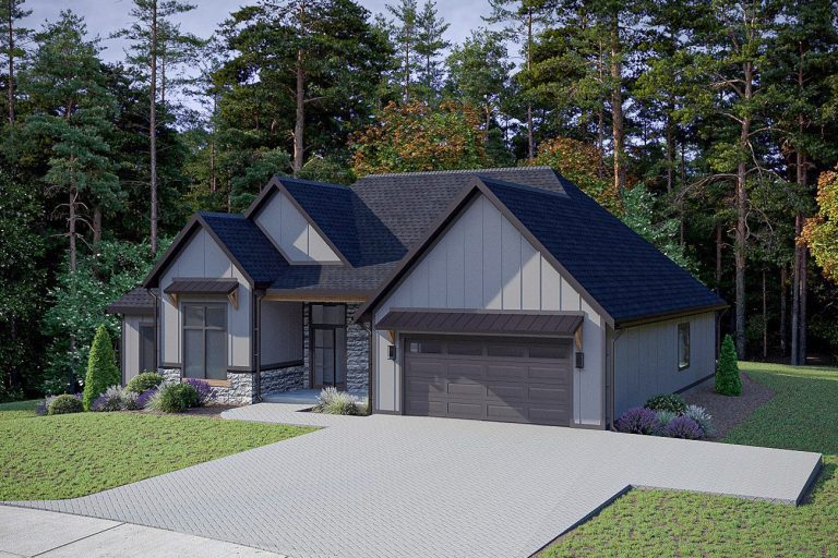 A modern, two-story house with a dark blue roof and gray siding surrounded by lush, green landscaping and tall pine trees. The house features a garage, stone accents, and large windows, creating a cozy and inviting atmosphere in the serene forest setting.